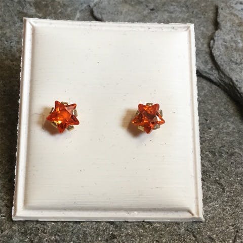 Guldörhängen med orange syntetisk sten