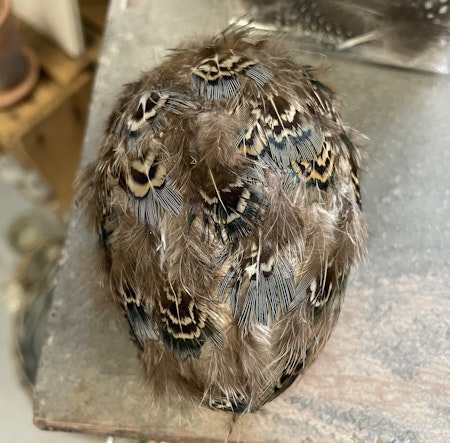 Ägg fjäder petrol