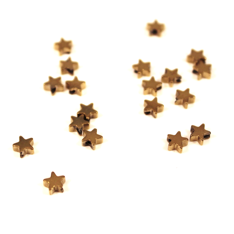 Guld Hematite Stjärnor 4mm 50st