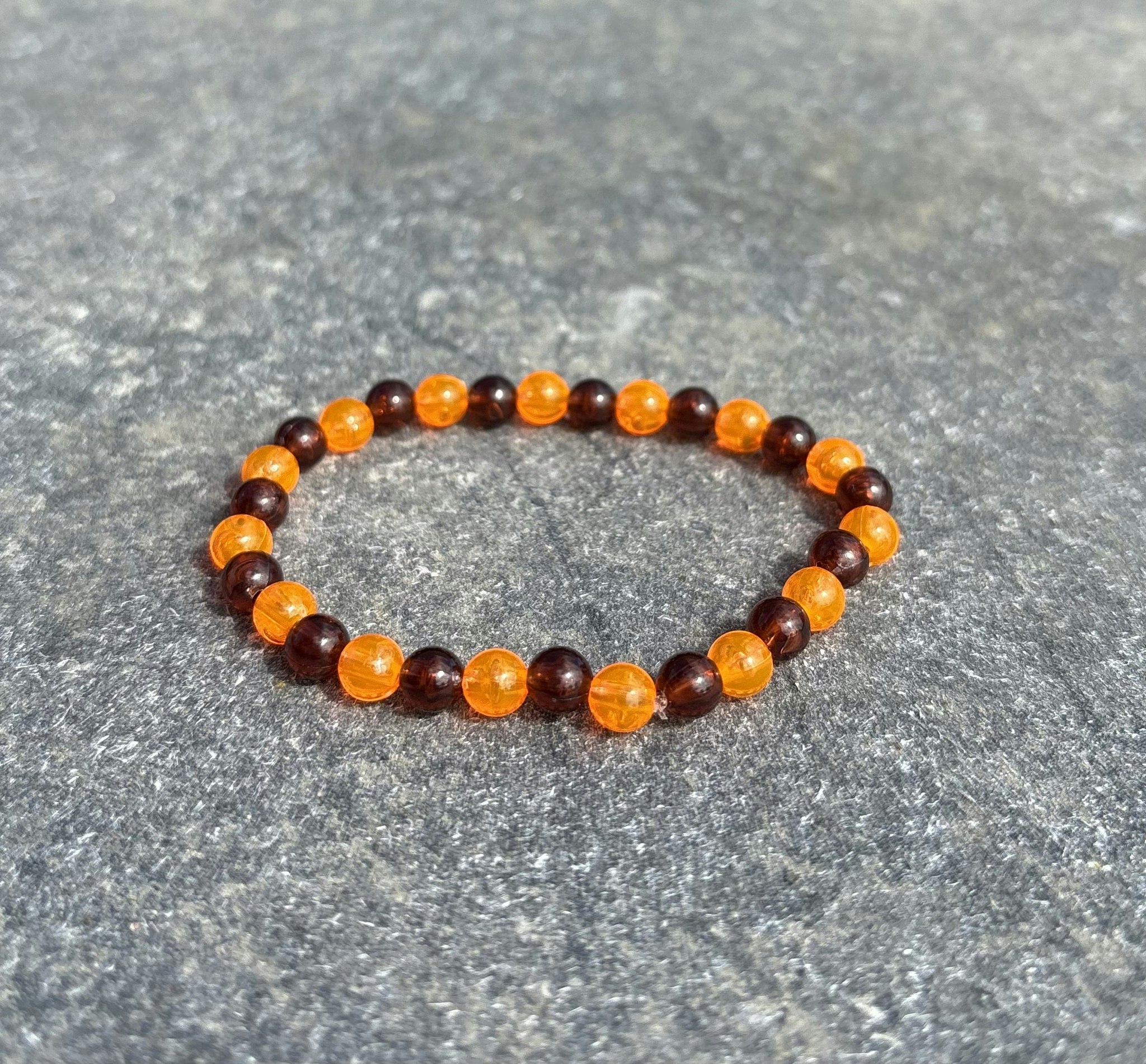 Orange brun armband med akrylpärla