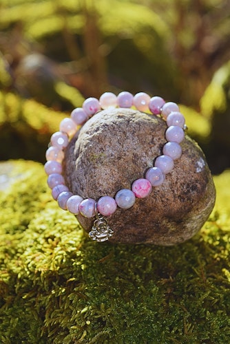Rosa armband med Buddha