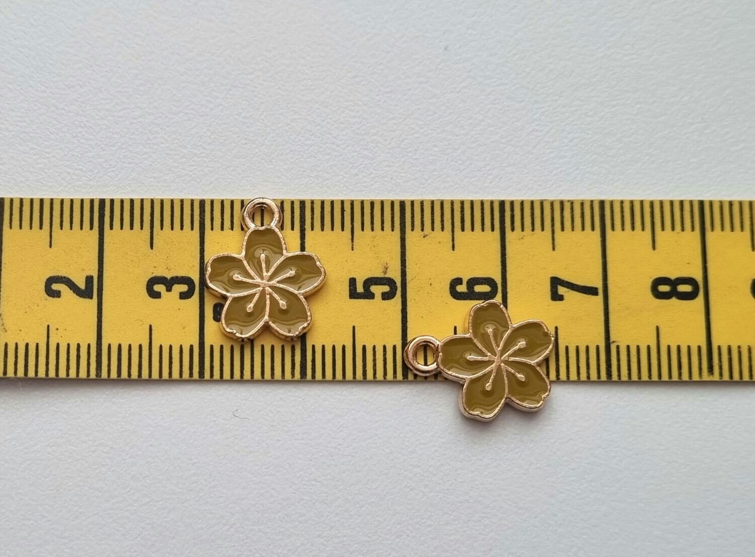 2 st mörkgula blommor, berlocker charms