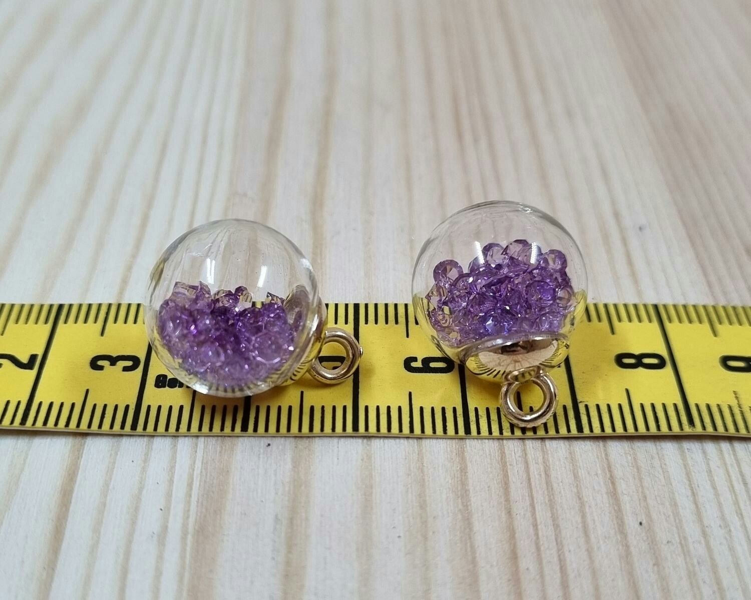 2 st runda, fyllda miniflaskor / glasflaskor med ögla (lila fyllning)