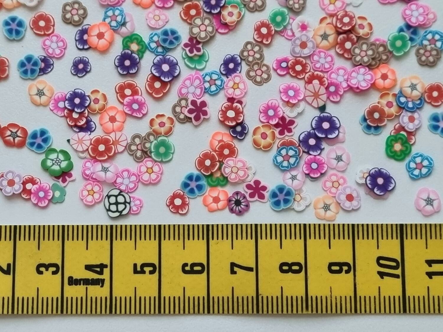 1000 st små blommor av mjuk lera, polymerlera för scrapbooking