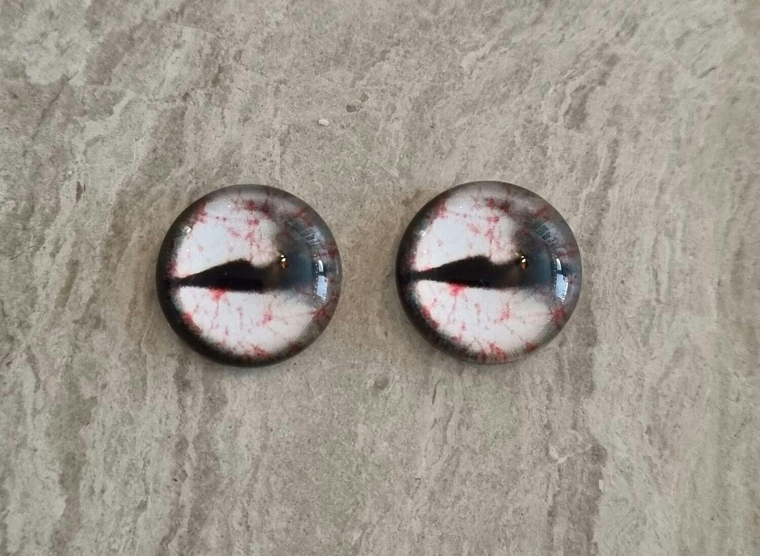 2 st drakögon kattögon i glas, glasinfattningar, cabochoner (12 mm)