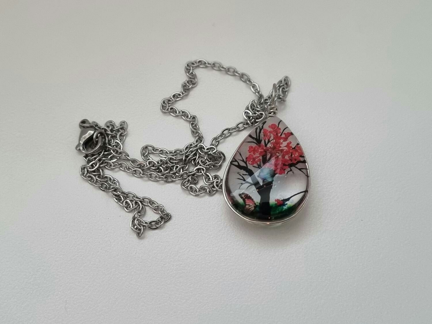 Halsband - Oval glasberlock med ett målat träd inuti (45 cm lång kedja)