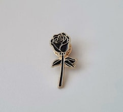 Pins, svart liten ros