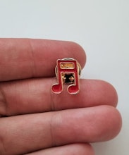Pins, röd liten not / musiknot
