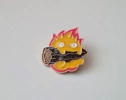 Pins, Elddemon över en stubbe