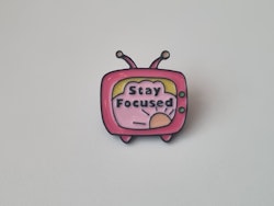 Pin med texten Stay Focused