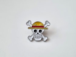 Pin, söt liten dödskalle