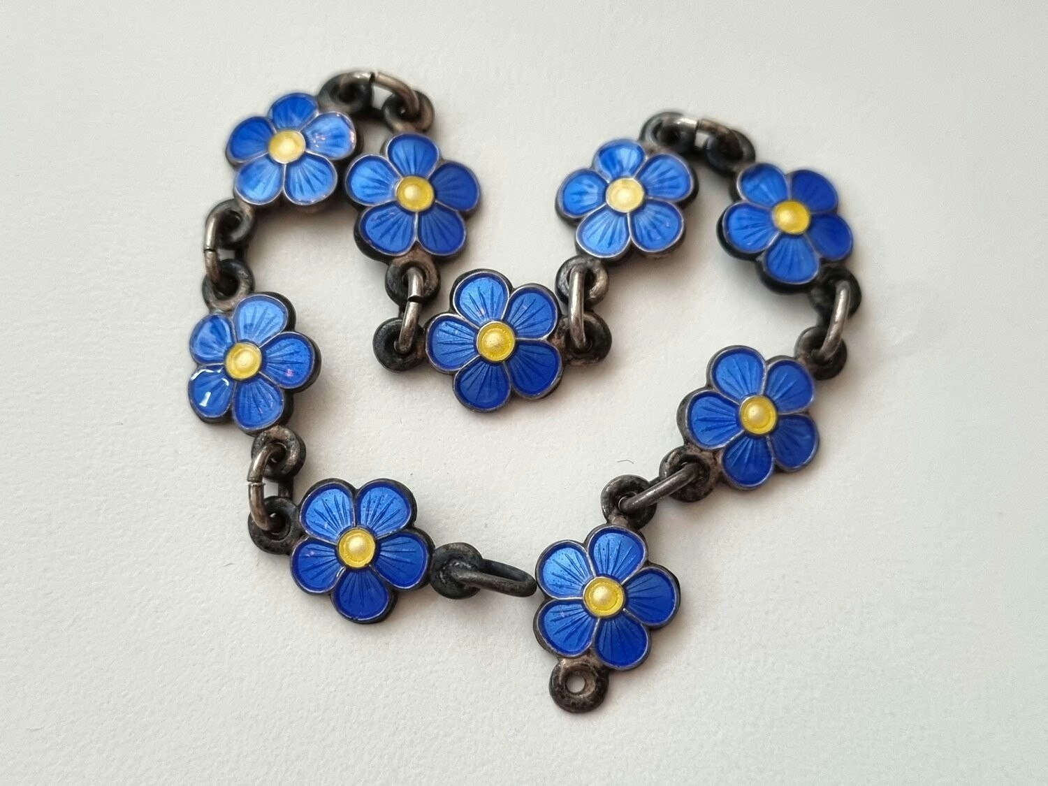 Armband, små blå/gula blommor