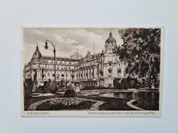 Vykort WIESBADEN. Hotel Nassauer Hof mit Blumengarten, 1930