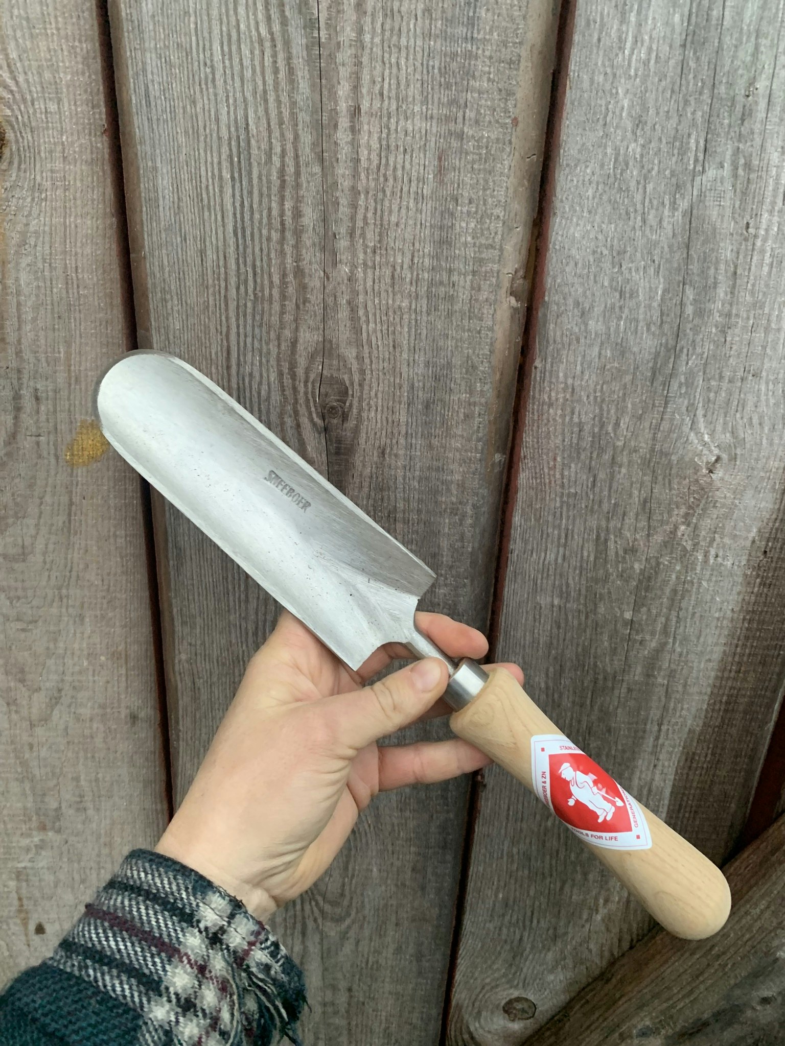handspade som håller