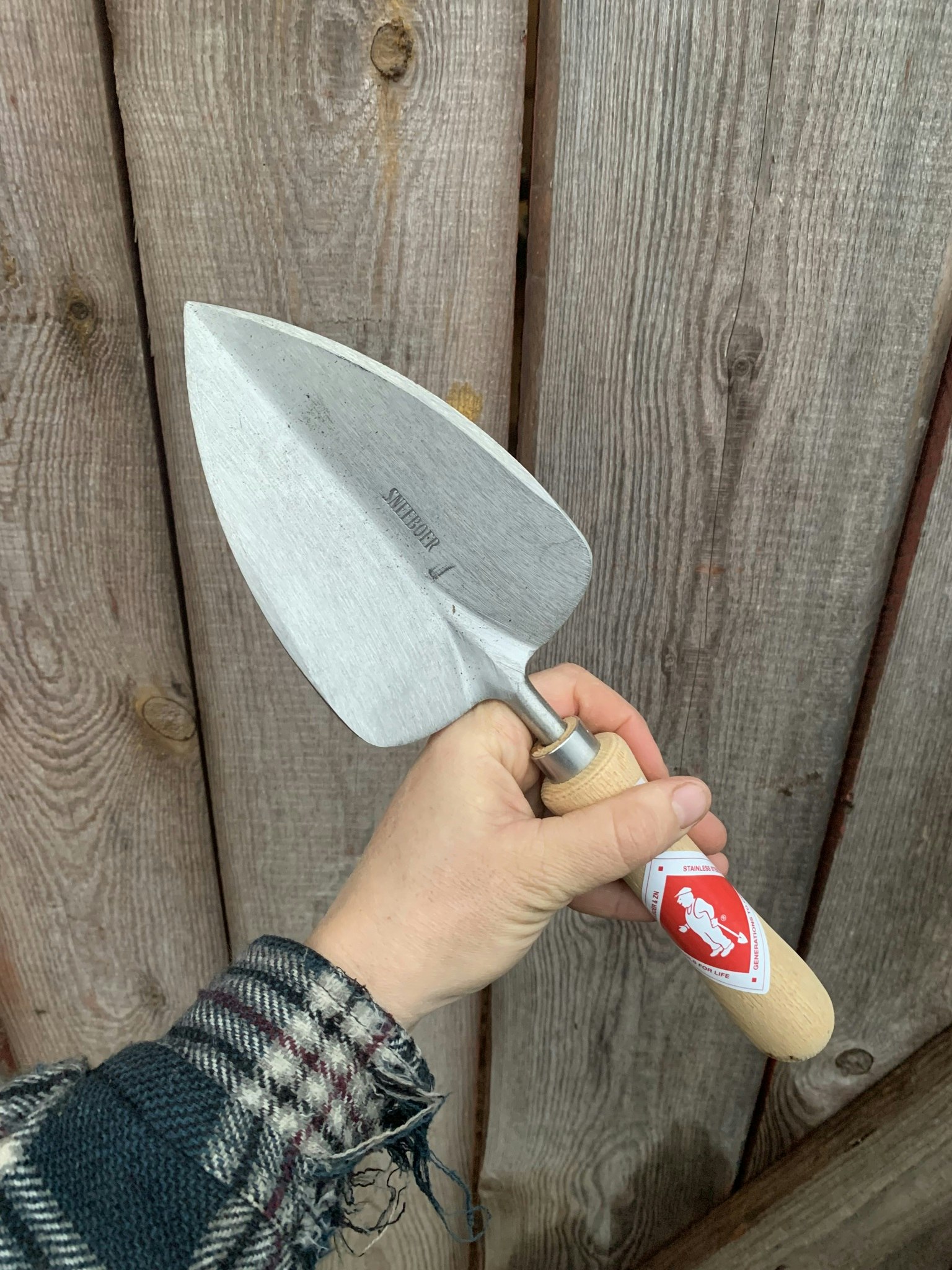 Planteringsspade som håller