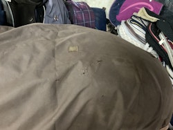 Amigo regntäcke, brunt, 0 gr, 155 cm, ngt hål, fattas en kryssgjord