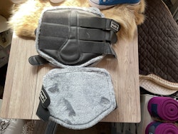 Benskydd med ludd,4-pack,svarta,f,nya