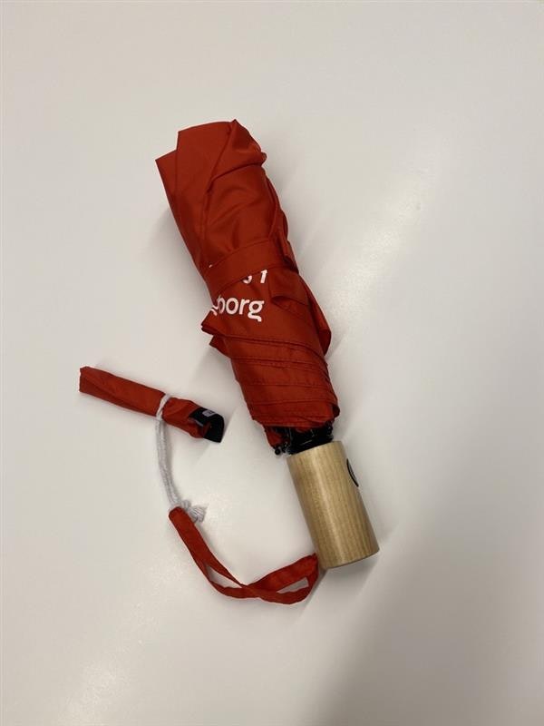 Rött hopfällbart paraply