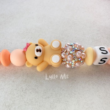 ID-KORT/ NYCKEL HÅLLARE med text Sjuksköterska med bling - DAISY CLIPS APRIKOS