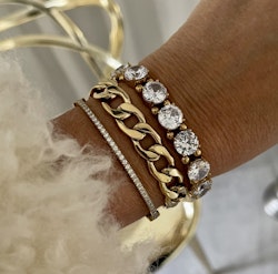 Celine armband i guld med klara stenar