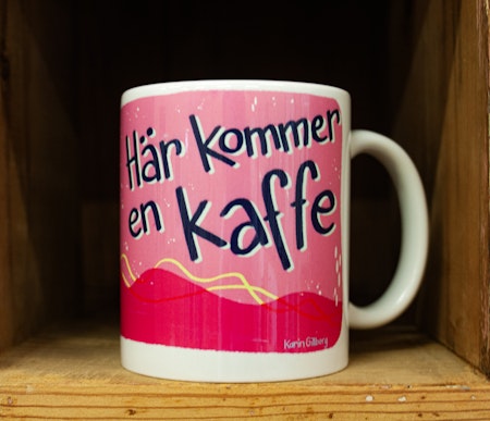 Kaffemugg med fågel