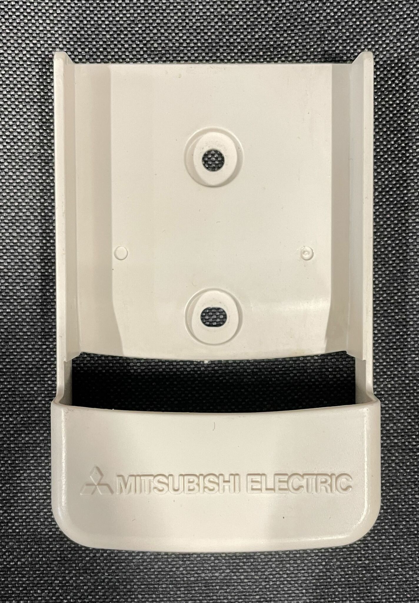 Holder with logo for Mitsubishi Electric remote control