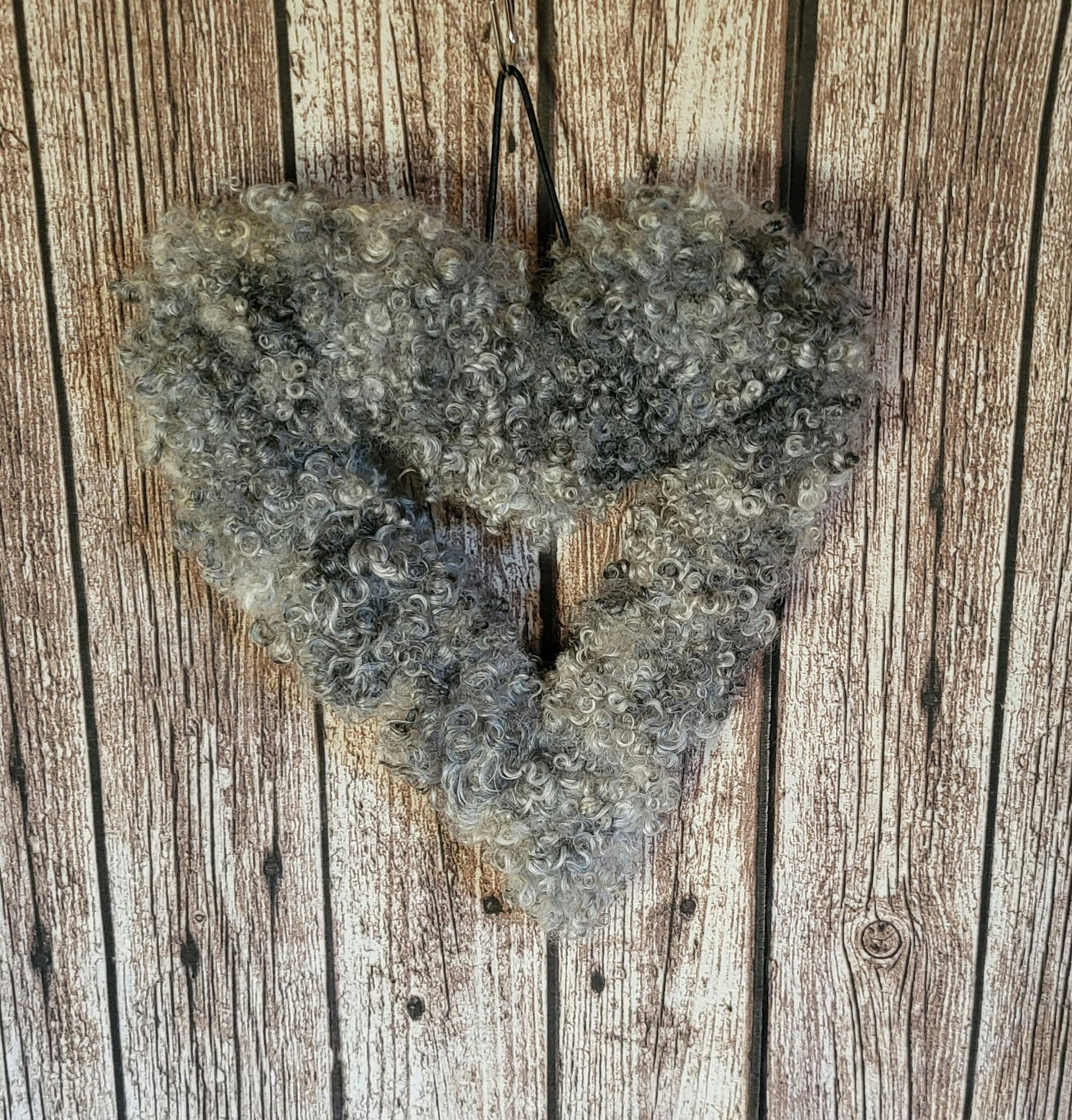 Hjärta, litet utan belysning. Grå.