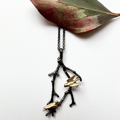 Peace Swallow Halskette - Bronze