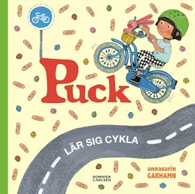 Puck lär sig cykla