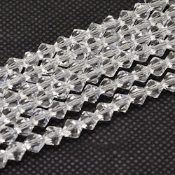 2100 Glaspärlor bicones 4mm transparent sträng
