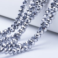 3130 Electropläterade rondeller 2,9x3,3x2mm silver sträng