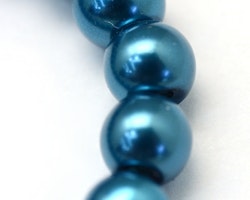 6mm pearlized glaspärlor på sträng Teal