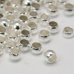 Klämpärlor silver 2-2,5mm 100stk