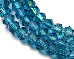 Glaspärlor bicones 4mm steel blue ab på sträng