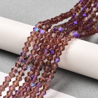 Glaspärlor bicones 4mm medium purple ab på sträng