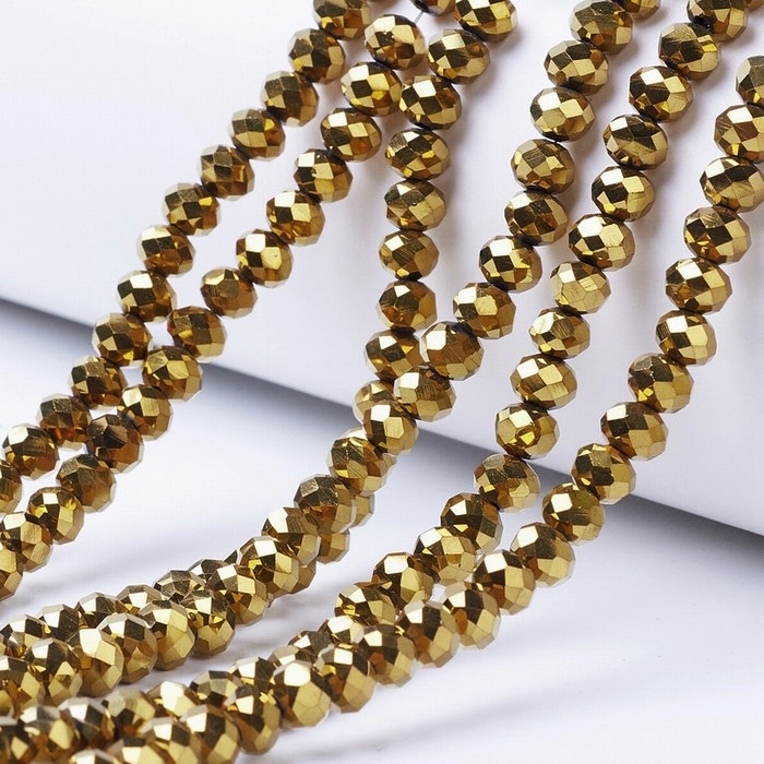 2440 Glaspärlor fasetterade abacus 3x2mm sträng guld