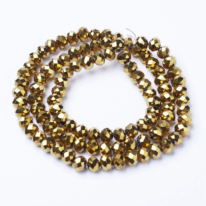 2440 Glaspärlor fasetterade abacus 3x2mm sträng guld