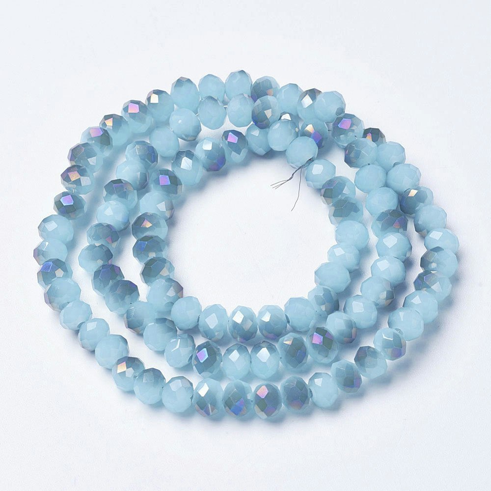 2439 Fasetterad rondell glaspärla 6mm på sträng light sky blue