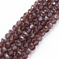 2970 Transparent saddle brown 4mm rund fasetterad glaspärla