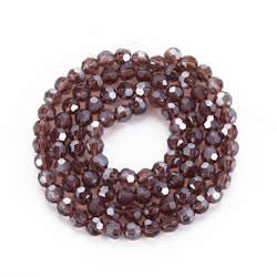 2970 Transparent saddle brown 4mm rund fasetterad glaspärla