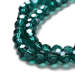 2971 Transparent teal 4mm rund fasetterad glaspärla