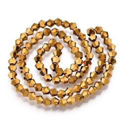 2972 Oljepläterade bicones 4mm guld