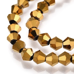 2972 Oljepläterade bicones 4mm guld