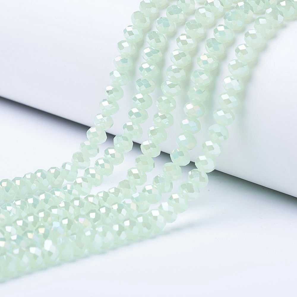 3060 Glaspärlor imitead jade fasetterad rondell 6mm på sträng pale green