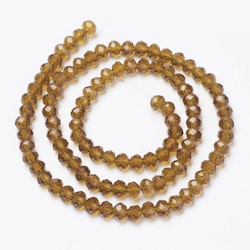 3070 glaspärla fasetterad rondell 4x3mm golden rod