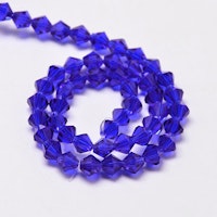 3095 Glaspärlor bicones 6mm på sträng transparent dark blue