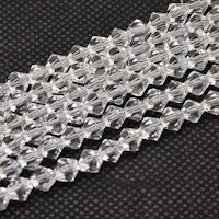 3097 Glaspärlor bicones 6mm på sträng transparent