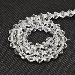 3097 Glaspärlor bicones 6mm på sträng transparent