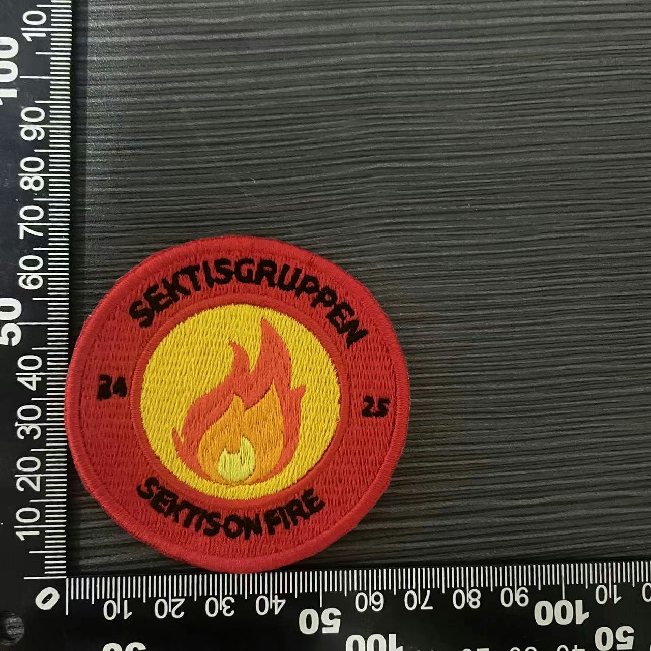 T061 Skräddarsytt Tygmärke