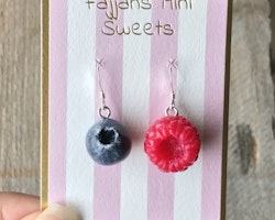 Earrings, a raspberry and a blueberry